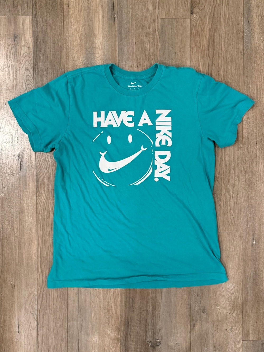 NikeTeal Short-Sleeve Graphic Tee with White Print - Have a Nike Day.
